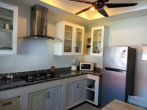 Comfort House | Private kitchen | Full-sized fridge, microwave, stovetop, coffee/tea maker - Peaceful 1 BR home in private residence (Koh Samui)