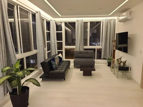 Suite few steps from beach family friendly WiFi