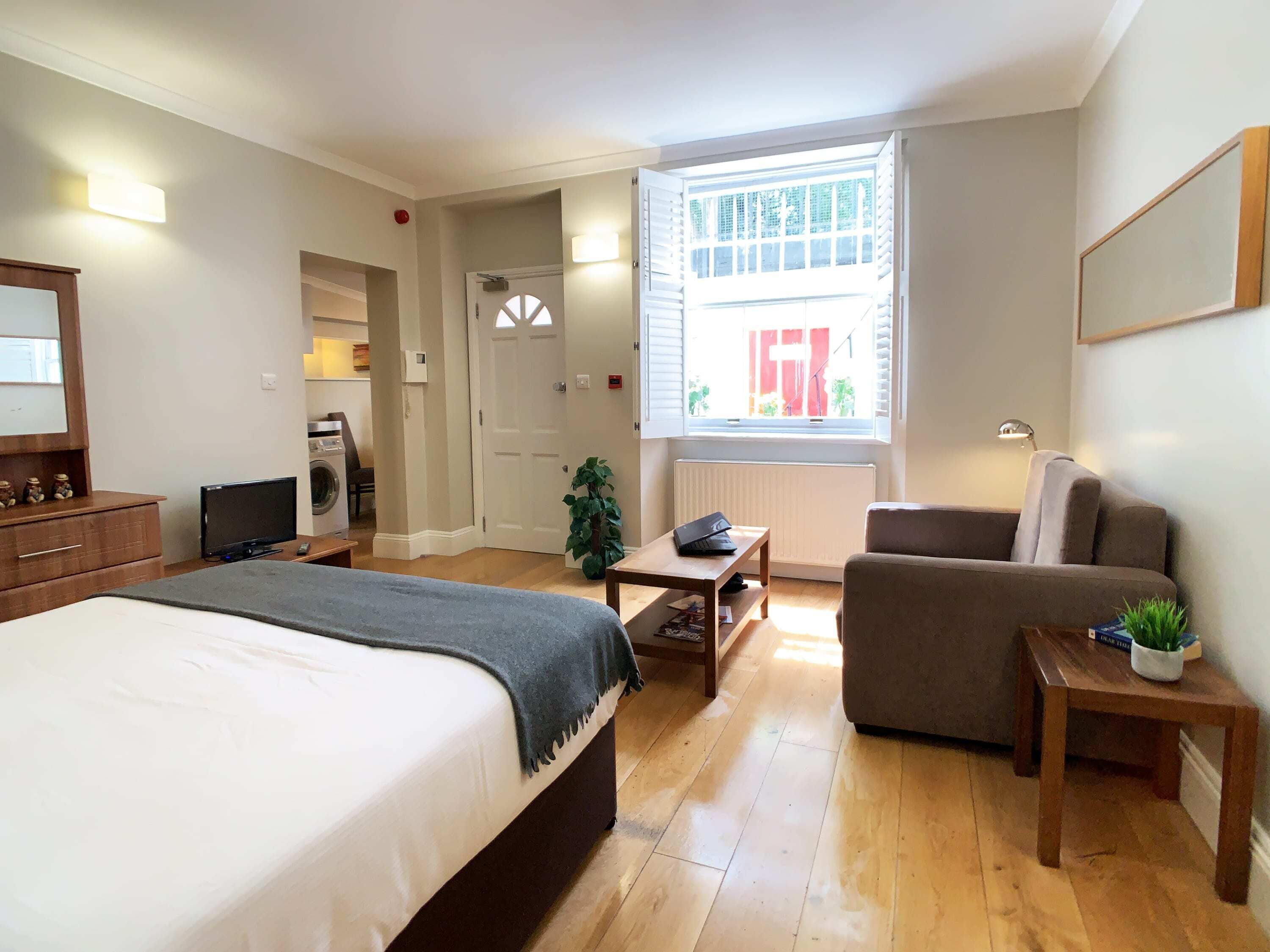 1 bedroom, desk, iron/ironing board, travel cot