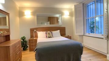 1 bedroom, desk, iron/ironing board, travel cot