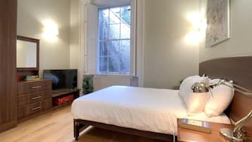 1 bedroom, desk, iron/ironing board, travel cot