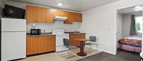 Fridge, microwave, stovetop, coffee/tea maker