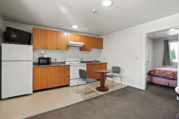 Fridge, microwave, stovetop, coffee/tea maker