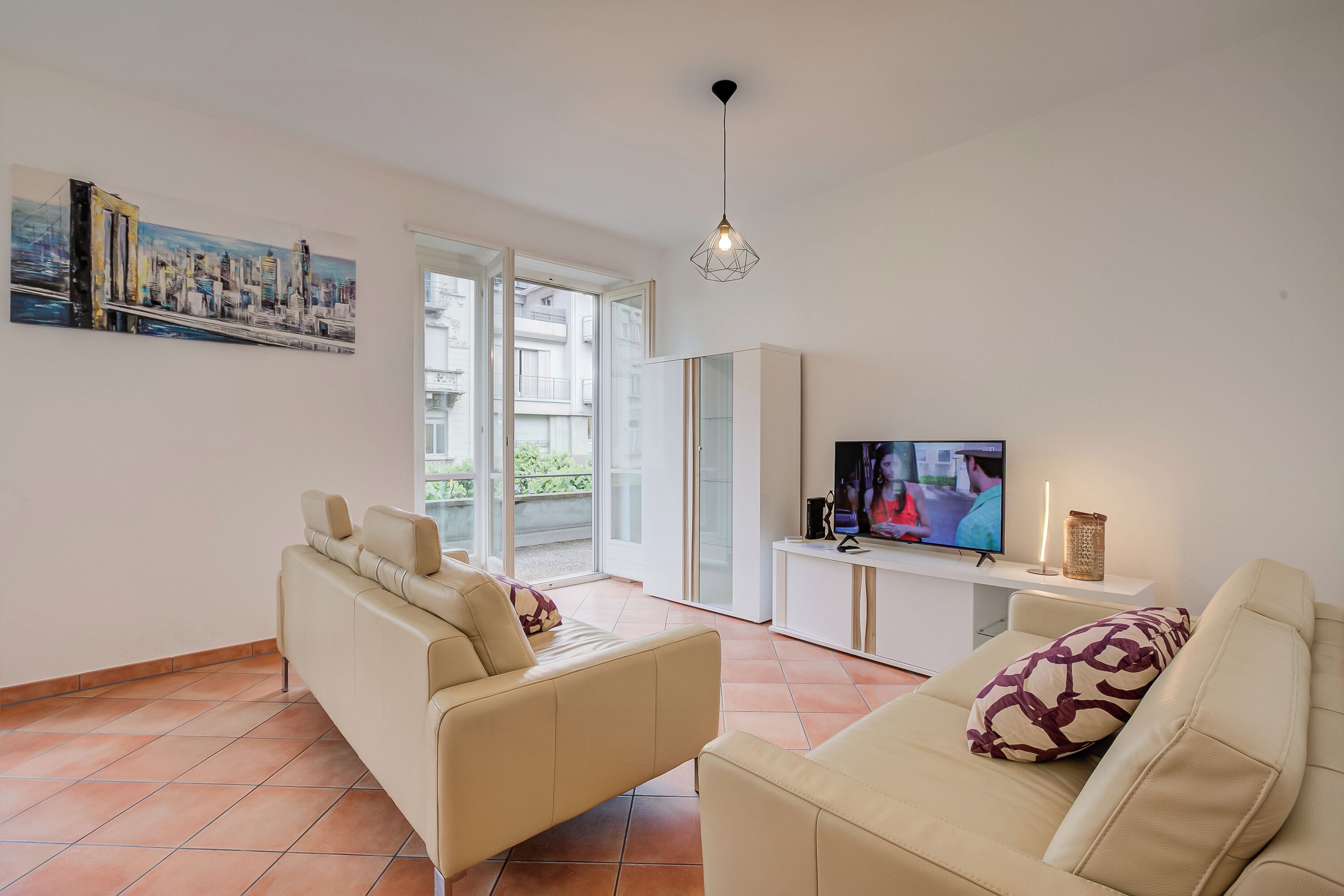 Standard Apartment, 3 Bedrooms (Bellinzona in centro) | Living area | 21-inch Smart TV with cable channels, TV