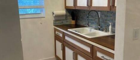 Combined shower/bathtub