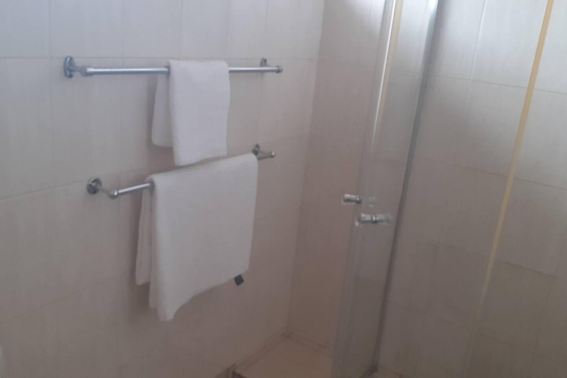 Apartment | Bathroom | Separate bathtub and shower, deep-soaking bathtub, towels