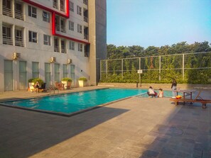 Outdoor pool - Fully Furnished Studio With Comfortable Design Monroe Tower Apartment (Cikarang)