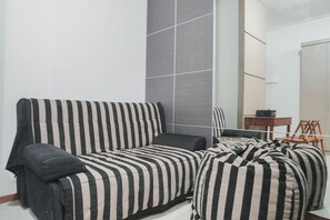 Appartement, 1 slaapkamer | Woonruimte | Televisie