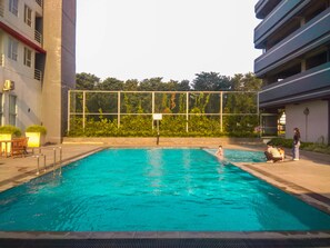 Outdoor pool - Cozy Studio At Monroe Tower Apartment (Cikarang)