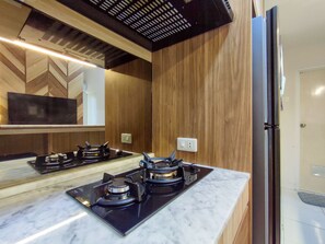 Private kitchen - Fancy And Nice 1Br With Extra Room At Amartha View Apartment (Semarang)