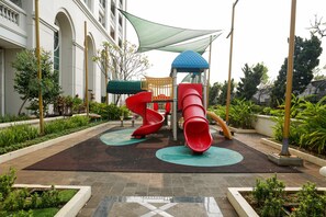 Children’s play area – outdoor - Comfy 1Br At Bellezza Apartment (Jakarta)