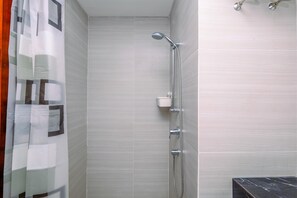 Studio | Bathroom - Fancy And Well Designed Studio At West Vista Apartment (Jakarta)