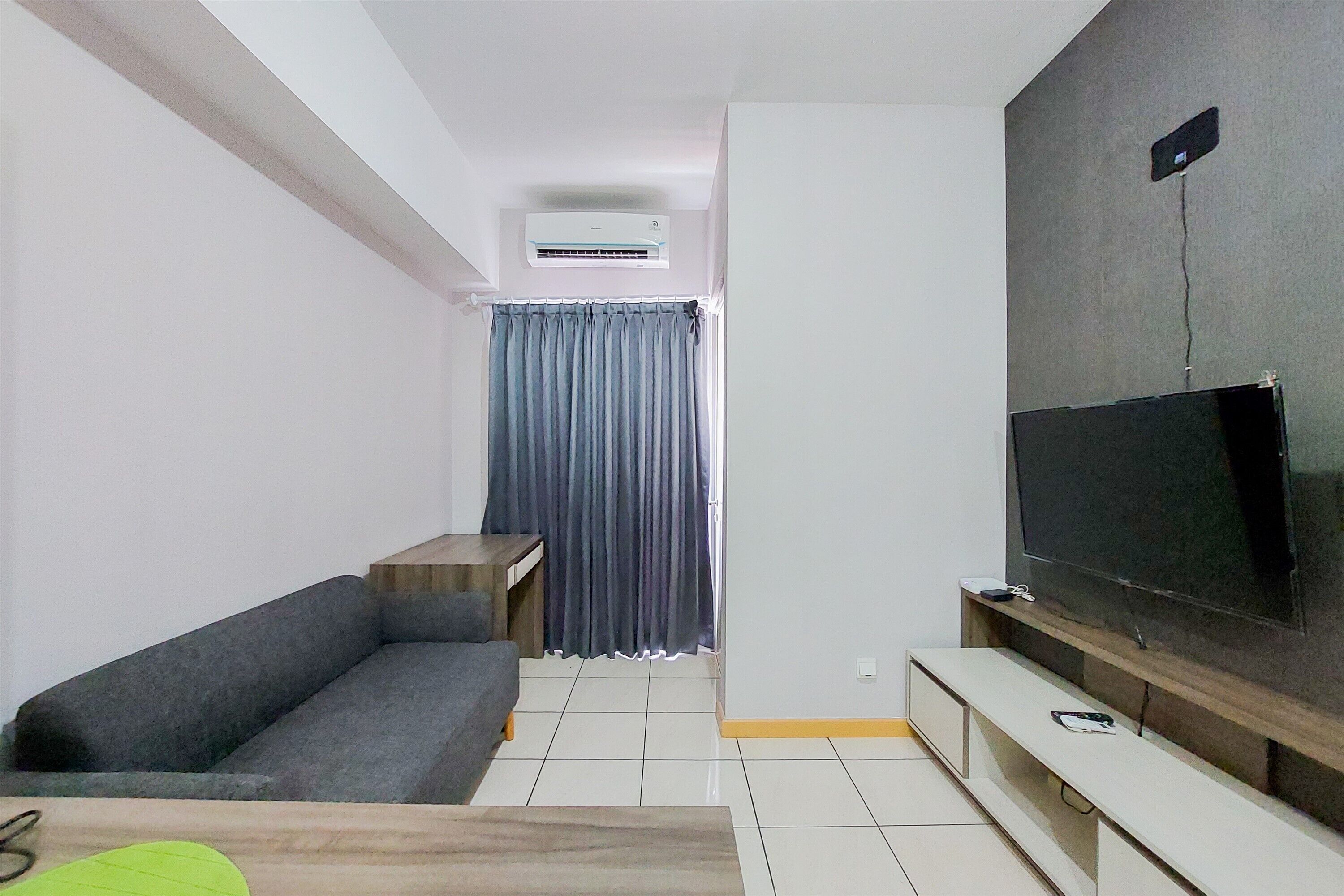Departamento, 2 habitaciones | Área de sala de estar | Televisión 