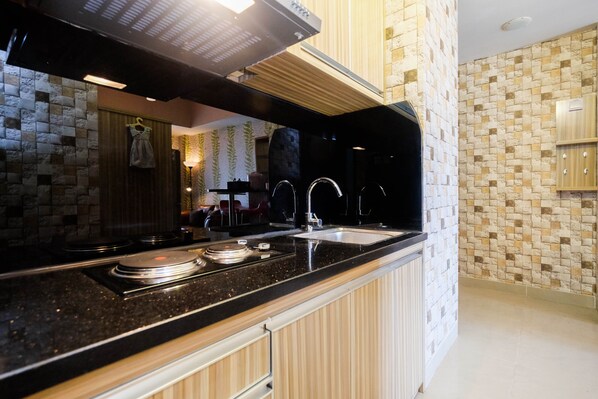 Apartment, 1 Bedroom | Private kitchen - Cozy 1Br Apartment With Workspace At Mustika Golf Residence (Cikarang)