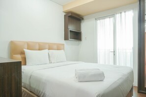 Estudio | Tabla de planchar con plancha, wifi gratis y ropa de cama 