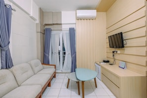 Apartemen, 2 kamar tidur | Area keluarga | TV