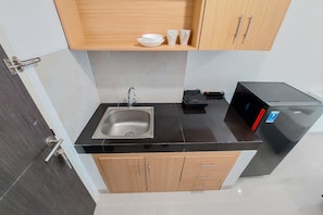 Estúdio | Cozinha privada | Geladeira, cooktop, talheres/pratos/utensílios de cozinha