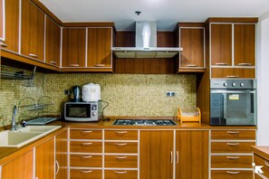 Apartment, 2 Bedrooms | Private kitchen - Elegant 2Br With Extra Room Apartment At Sudirman Tower Condominium (Jakarta)