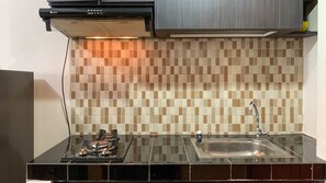 Studio | Private kitchen - Comfort And Homey Studio At Margonda Residence 5 Apartment (Depok)