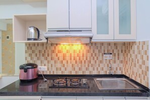 Apartment, 2 Bedrooms | Private kitchen - 2Br With Cozy Style At Bassura City Apartment (Jakarta)