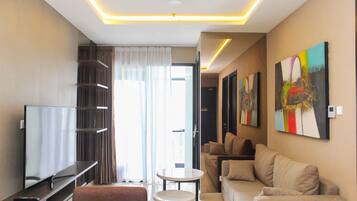 Apartment, 2 Bedrooms | Living area | TV