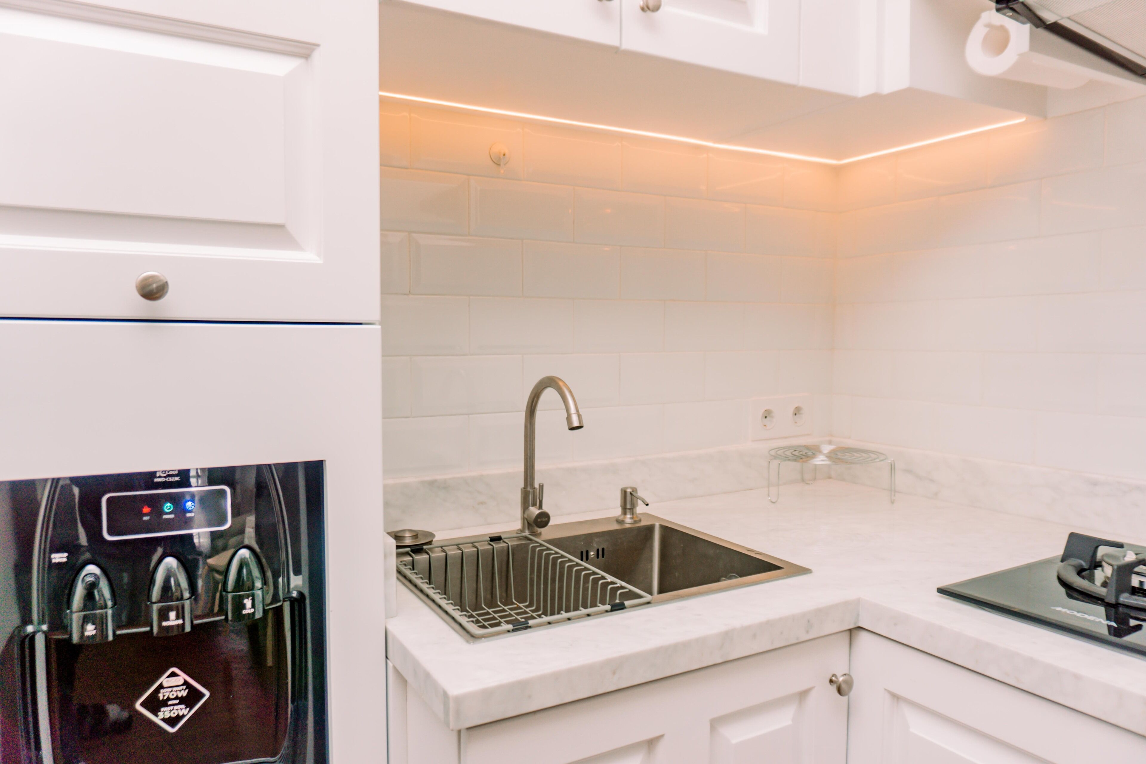 Apartamento, 2 quartos | Cozinha privada | Geladeira, cooktop, talheres/pratos/utensílios de cozinha