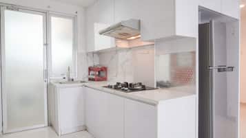 Apartment | Private kitchen | Fridge, stovetop, cookware/dishes/utensils