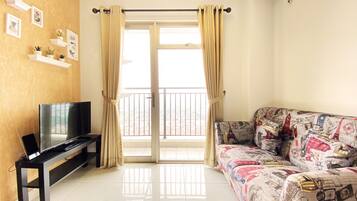 Departamento, 2 habitaciones | Área de sala de estar | Televisión