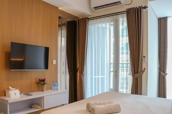 Studio | Free WiFi - Elegant And Comfy Studio At Tamansari Iswara Apartment (Bekasi)