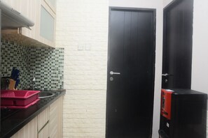 Appartement, 2 chambres | Cuisine privée | Réfrigérateur, surface de cuisson, bouilloire électrique