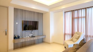 Apartment | Living area | TV - Spacious And Elegant 3Br Apartment At La Riz Supermall Mansion (Surabaya)