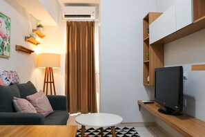 Apartment, 2 Bedrooms | Living area | TV - Tranquil Designed And Homey 2Br At Springlake Summarecon Bekasi Apartment (Bekasi)