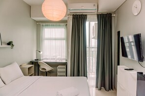 Free WiFi, bed sheets - Cozy Studio At Serpong Garden Apartment (Cisauk)