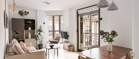 Apartment, 2 Bedrooms | Living area | 42-inch TV with digital channels