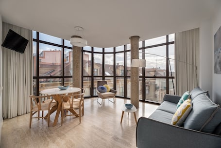 Apartment, 1 Bedroom | Living area | 42-inch TV with digital channels