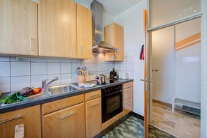 Standard Apartment, Multiple Bedrooms (Top Of The Spots) | Private kitchen | Fridge, oven, stovetop, dishwasher