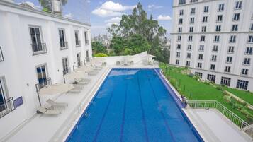 Outdoor pool, pool umbrellas, sun loungers