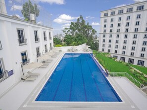 Outdoor pool, pool umbrellas, pool loungers