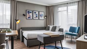 Apartment, 1 Bedroom | In-room safe, blackout drapes, soundproofing, iron/ironing board