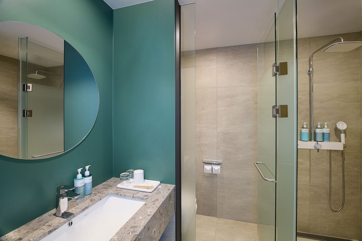 superior room, multiple beds | bathroom | shower, eco-friendly toiletries, hair dryer, bathrobes