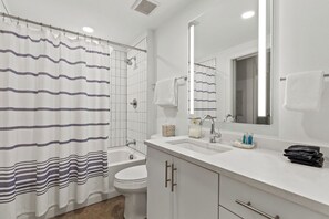 Hair dryer, towels, soap, shampoo