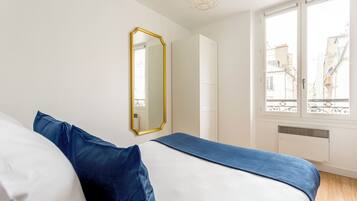 2 bedrooms, desk, iron/ironing board, travel crib