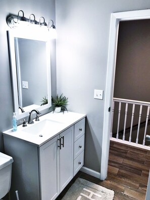 Shower, towels, soap, toilet paper