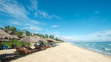 Una spiaggia nelle vicinanze, teli da spiaggia