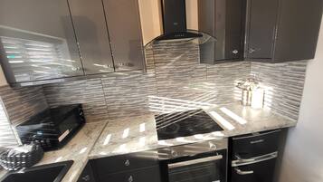 Apartment | Private kitchen | Fridge, microwave, oven, stovetop