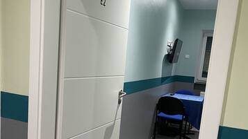 Triple Room, Private Bathroom, Garden View | Individually furnished, desk, laptop workspace, blackout drapes