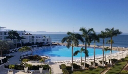 CONDO FLAMINGO  BY TRVL2HM