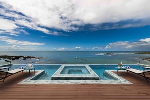 Outdoor pool, pool umbrellas, sun loungers