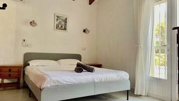 2 dormitorios, tabla de planchar con plancha, wifi gratis y ropa de cama