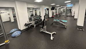 A gym with various exercise equipment, including dumbbells, weight machines, and exercise balls. - Newly furnished 1 bed, steps to Boston's restaurants, museums, hospitals, Fenway (Boston)